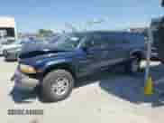 2001 Dodge Dakota Sport z VIN 1B7GG22N01S270009, wystawiony jako Copart lot #70438494 z przebiegiem Nie podano mil oraz Szkoda całkowita • Salvage title. Historia ofert i sprzedaży dostępna na DreamBid. Obrazek 1.