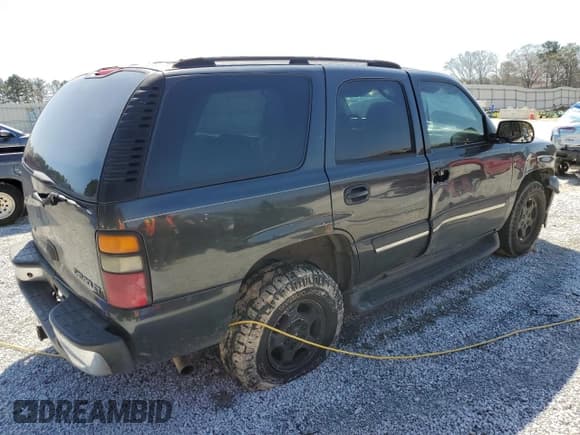 ✅ 2004 Chevrolet Tahoe LS • VIN: 1GNEC13Z04R220177 • Lot: 48406255. Listed on Copart with 215,167 mi. Free auction sales archive from the USA and detailed vehicle history report at DreamBid. Image 3.