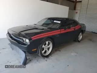 2013 Dodge Challenger R/T Classic z VIN 2C3CDYBT5DH669880, wystawiony jako Copart lot #62675265 z przebiegiem 147 627 mil mil oraz Czysty tytuł • Clean title. Historia ofert i sprzedaży dostępna na DreamBid. Obrazek 1.