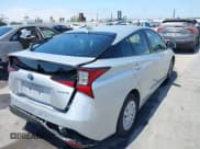✅ 2021 Toyota Prius L Eco • VIN: JTDKAMFU8M3150739 • Лот: 42548652. Опубликован ранее на IAAI с пробегом 118 303 миль. Бесплатный доступ к архиву аукционных продаж из США и подробный отчёт об истории автомобиля на DreamBid. Изображение 4.