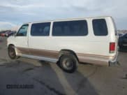 ✅ 2000 Ford Econoline Passenger XL • VIN: 1FBSS31L5YHA09064 • Lot: 84828844. Listed on Copart with 257,973 mi. Free auction sales archive from the USA and detailed vehicle history report at DreamBid. Image 2.