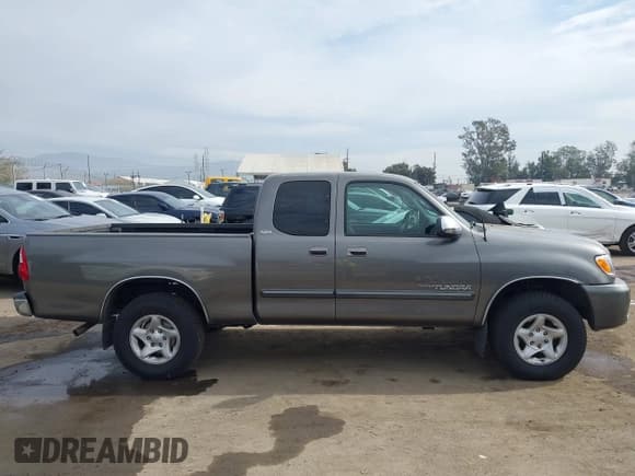 ✅ 2003 Toyota Tundra SR5 • VIN: 5TBRT34153S372205 • Лот: 43686825. Опубликован ранее на IAAI с пробегом 144 492 миль. Бесплатный доступ к архиву аукционных продаж из США и подробный отчёт об истории автомобиля на DreamBid. Изображение 13.