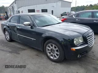 ✅ 2009 Chrysler 300 C Hemi • VIN: 2C3LA63T59H580961 • Lot: 43235420. Wystawiony na IAAI z przebiegiem 167 886 mil. Bezpłatny archiwum sprzedaży aukcyjnych z USA i szczegółowy raport historii pojazdu na DreamBid. Zdjęcie 1.