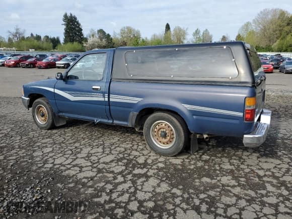 ✅ 1990 Toyota Pickup DX • VIN: JT4RN81P7L5065454 • Лот: 52913465. Опубликован ранее на Copart с пробегом 366 591 миль. Бесплатный доступ к архиву аукционных продаж из США и подробный отчёт об истории автомобиля на DreamBid. Изображение 2.