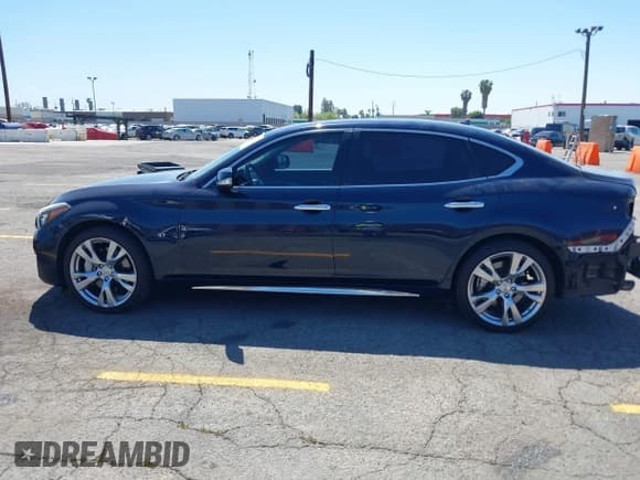 ✅ 2015 Infiniti Q70 • VIN: JN1BY1PP8FM601834 • Lot: 42028330. Listed on IAAI with 106,285 mi. Free auction sales archive from the USA and detailed vehicle history report at DreamBid. Image 14.
