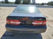 ✅ 2000 Lexus ES 300 • VIN: JT8BF28G4Y5100202 • Лот: 86711005. Опубликован ранее на Copart с пробегом 159 493 миль. Бесплатный доступ к архиву аукционных продаж из США и подробный отчёт об истории автомобиля на DreamBid. Изображение 6.