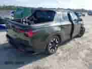 2025 Hyundai Santa Cruz SEL with VIN 5NTJBDDE4SH129880, listed as a IAAI auction lot 41524264 with 4,655 mi miles and . Bid and sale history available at DreamBid. Image 4.