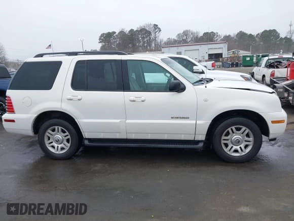 ✅ 2002 Mercury Mountaineer • VIN: 4M2ZU86W12ZJ35003 • Лот: 41193635. Опубликован ранее на IAAI с пробегом 168 601 миль. Бесплатный доступ к архиву аукционных продаж из США и подробный отчёт об истории автомобиля на DreamBid. Изображение 13.