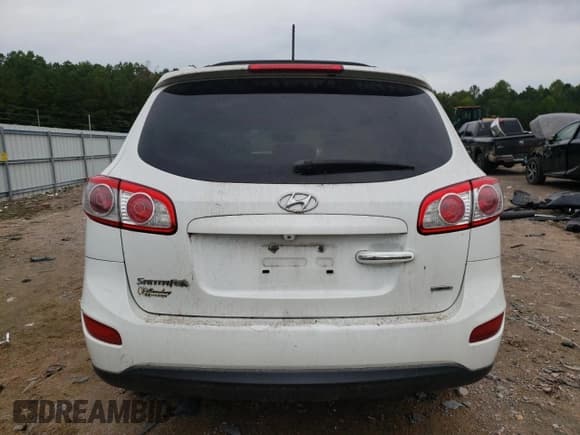 ✅ 2012 Hyundai Santa Fe Limited • VIN: 5XYZK4AG9CG138803 • Lot: 72385414. Listed on Copart with 140,718 mi. Free auction sales archive from the USA and detailed vehicle history report at DreamBid. Image 6.