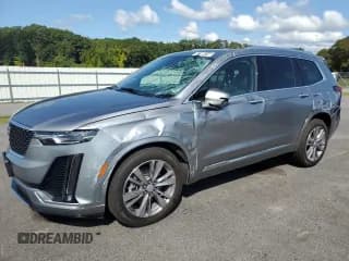 ✅ 2025 Cadillac XT6 AWD Premium Luxury • VIN: 1GYKPDRS4SZ120103 • Lot: 71904145. Listed on Copart with 11,818 mi. Free auction sales archive from the USA and detailed vehicle history report at DreamBid. Image 1.