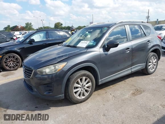 ✅ 2016 Mazda CX-5 Sport • VIN: JM3KE2BY0G0757538 • Лот: 43437546. Опубликован ранее на IAAI с пробегом 156 787 миль. Бесплатный доступ к архиву аукционных продаж из США и подробный отчёт об истории автомобиля на DreamBid. Изображение 2.