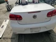 ✅ 2013 Volkswagen Eos Lux • VIN: WVWFW8AH7DV002056 • Лот: 71265314. Опубликован ранее на Copart с пробегом Не указан. Бесплатный доступ к архиву аукционных продаж из США и подробный отчёт об истории автомобиля на DreamBid. Изображение 11.
