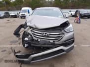 ✅ 2017 Hyundai Santa Fe 2.4L • VIN: 5XYZTDLBXHG418865 • Lot: 72195542. Listed on Copart with 131,058 mi. Free auction sales archive from the USA and detailed vehicle history report at DreamBid. Image 10.