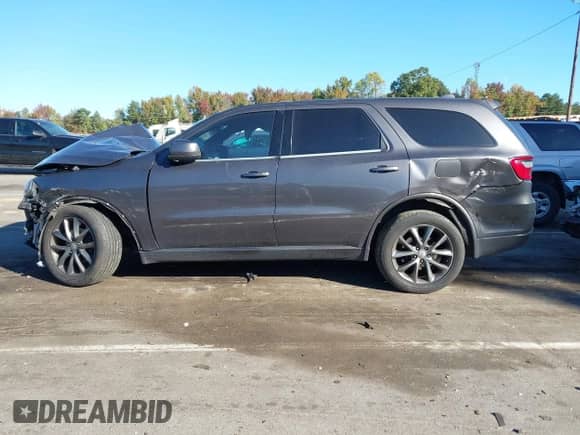 2015 Dodge Durango SXT z VIN 1C4RDJAG7FC120754, wystawiony jako IAAI lot #43473588 z przebiegiem 246 090 mil mil oraz . Historia ofert i sprzedaży dostępna na DreamBid. Obrazek 14.