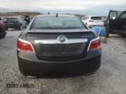 ✅ 2013 Buick LaCrosse Touring • VIN: 1G4GJ5E39DF178161 • Лот: 90990525. Опубликован ранее на Copart с пробегом 184 383 миль. Бесплатный доступ к архиву аукционных продаж из США и подробный отчёт об истории автомобиля на DreamBid. Изображение 6.