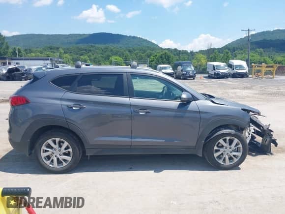 2019 Hyundai Tucson Value with VIN KM8J33A46KU052965, listed as a IAAI auction lot 42662016 with 115,861 mi miles and . Bid and sale history available at DreamBid. Image 14.