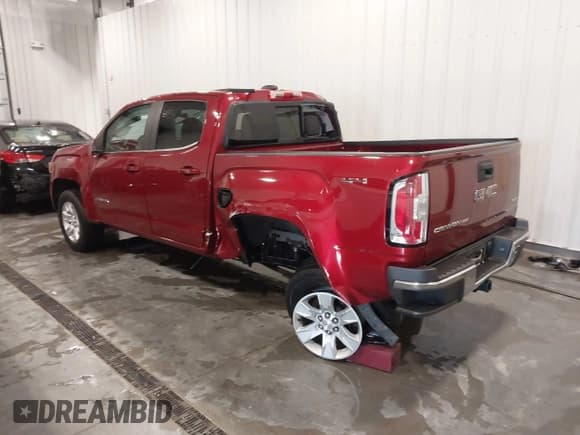 ✅ 2018 GMC Canyon 4WD SLE • VIN: 1GTG6CEN1J1174643 • Лот: 43660608. Опубликован ранее на IAAI с пробегом 83 972 миль. Бесплатный доступ к архиву аукционных продаж из США и подробный отчёт об истории автомобиля на DreamBid. Изображение 3.