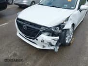 ✅ 2014 Mazda 3 S Touring • VIN: JM1BM1V36E1111496 • Лот: 42427752. Опубликован ранее на IAAI с пробегом 132 211 миль. Бесплатный доступ к архиву аукционных продаж из США и подробный отчёт об истории автомобиля на DreamBid. Изображение 6.