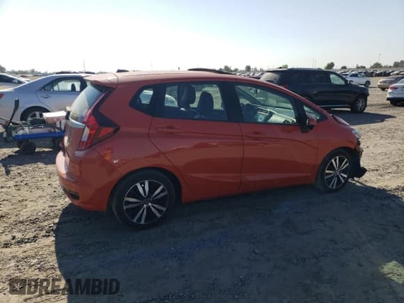 ✅ 2018 Honda Fit EX-L • VIN: 3HGGK5H94JM709622 • Лот: 66578915. Опубликован ранее на Copart с пробегом 77 741 миль. Бесплатный доступ к архиву аукционных продаж из США и подробный отчёт об истории автомобиля на DreamBid. Изображение 3.