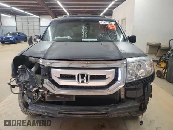 ✅ 2011 Honda Pilot EX-L • VIN: 5FNYF4H57BB039455 • Лот: 91595295. Опубликован ранее на Copart с пробегом Не указан. Бесплатный доступ к архиву аукционных продаж из США и подробный отчёт об истории автомобиля на DreamBid. Изображение 5.