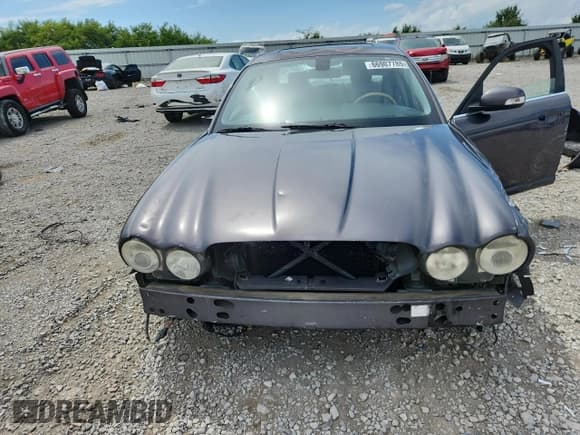 ✅ 2008 Jaguar XJ 8 LWB • VIN: SAJWA79B58SH22718 • Лот: 66907785. Опубликован ранее на Copart с пробегом Не указан. Бесплатный доступ к архиву аукционных продаж из США и подробный отчёт об истории автомобиля на DreamBid. Изображение 11.