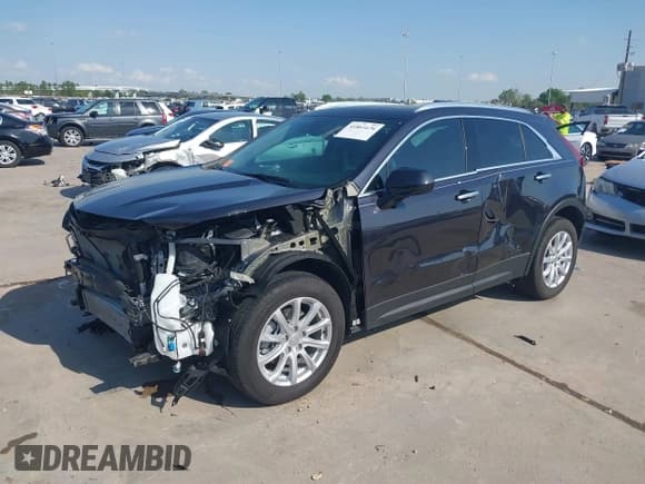 ✅ 2023 Cadillac XT4 FWD Luxury • VIN: 1GYAZAR47PF145379 • Lot: 41861676. Listed on IAAI with 5,556 mi. Free auction sales archive from the USA and detailed vehicle history report at DreamBid. Image 2.