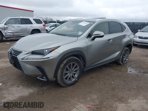 ✅ 2021 Lexus NX 300 • VIN: JTJDARDZXM2244015 • Lot: 41560663. Wystawiony na IAAI z przebiegiem 91 343 mil. Bezpłatny archiwum sprzedaży aukcyjnych z USA i szczegółowy raport historii pojazdu na DreamBid. Zdjęcie 2.