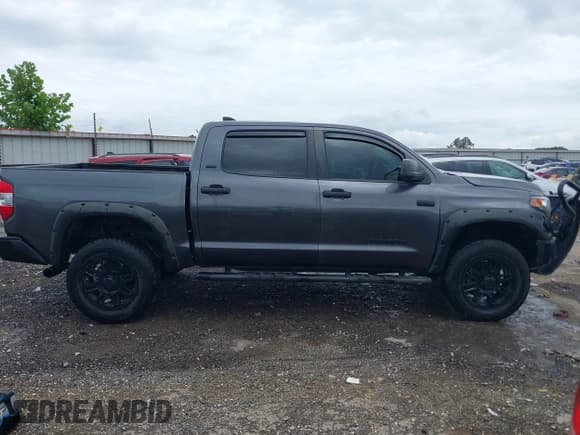 ✅ 2021 Toyota Tundra SR5 • VIN: 5TFDY5F1XMX025833 • Lot: 42442498. Listed on IAAI with 70,419 mi. Free auction sales archive from the USA and detailed vehicle history report at DreamBid. Image 13.