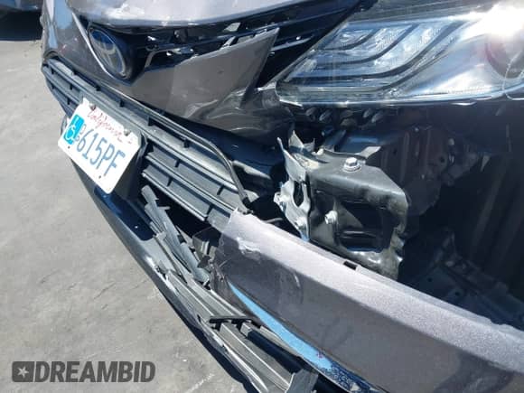 2022 Toyota Camry Hybrid XLE with VIN 4T1F31AK4NU571560, listed as a IAAI auction lot 42654973 with 10,810 mi miles and . Bid and sale history available at DreamBid. Image 18.