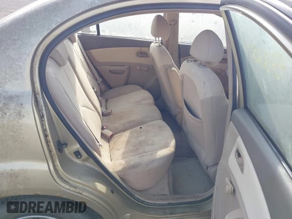 ✅ 2006 Kia Rio • VIN: KNADE123266164966 • Lot: 43133087. Wystawiony na IAAI z przebiegiem 49 558 mil. Bezpłatny archiwum sprzedaży aukcyjnych z USA i szczegółowy raport historii pojazdu na DreamBid. Zdjęcie 8.