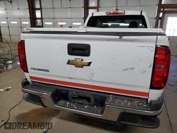 ✅ 2018 Chevrolet Colorado 2WD Work Truck • VIN: 1GCHSBEA2J1143280 • Лот: 76504264. Опубликован ранее на Copart с пробегом 82 077 миль. Бесплатный доступ к архиву аукционных продаж из США и подробный отчёт об истории автомобиля на DreamBid. Изображение 6.