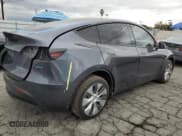 ✅ 2023 Tesla Model Y Long Range • VIN: 7SAYGDEE6PF848778 • Lot: 93710175. Wystawiony na Copart z przebiegiem 34 473 mil. Bezpłatny archiwum sprzedaży aukcyjnych z USA i szczegółowy raport historii pojazdu na DreamBid. Zdjęcie 3.