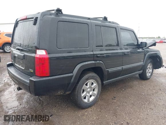 ✅ 2007 Jeep Commander Sport • VIN: 1J8HG48P17C632997 • Lot: 42319292. Listed on IAAI with 99,129 mi. Free auction sales archive from the USA and detailed vehicle history report at DreamBid. Image 4.