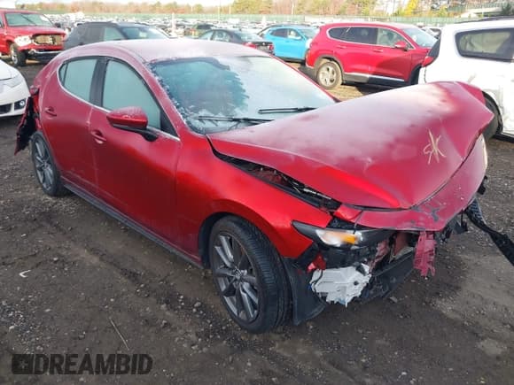 ✅ 2021 Mazda 3 Select • VIN: JM1BPBKL3M1313258 • Lot: 43732790. Listed on IAAI with 34,659 mi. Free auction sales archive from the USA and detailed vehicle history report at DreamBid. Image 1.