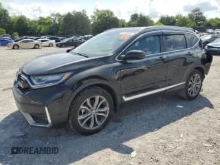 ✅ 2021 Honda CR-V Touring • VIN: 7FARW1H94ME006653 • Lot: 61679445. Listed on Copart with 34,526 mi. Free auction sales archive from the USA and detailed vehicle history report at DreamBid. Image 1.