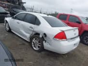 ✅ 2014 Chevrolet Impala LTZ • VIN: 2G1WC5E33E1167345 • Lot: 43548449. Listed on IAAI with 222,330 mi. Free auction sales archive from the USA and detailed vehicle history report at DreamBid. Image 3.