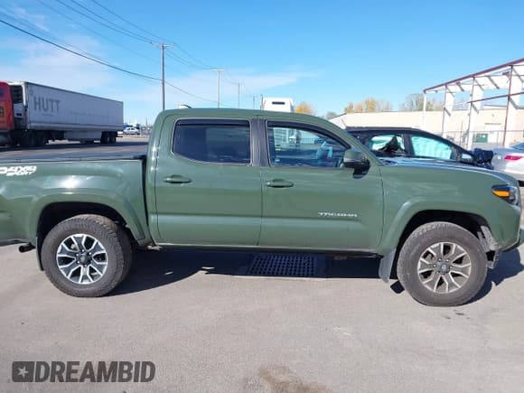 ✅ 2021 Toyota Tacoma SR • VIN: 3TYCZ5AN2MT023832 • Lot: 43542339. Listed on IAAI with 80,341 mi. Free auction sales archive from the USA and detailed vehicle history report at DreamBid. Image 13.