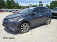 ✅ 2016 Toyota RAV4 Limited • VIN: JTMDFREVXGJ076533 • Lot: 57480995. Listed on Copart with 124,626 mi. Free auction sales archive from the USA and detailed vehicle history report at DreamBid. Image 1.