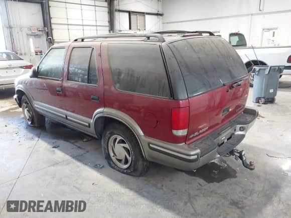 1998 Chevrolet Blazer LT with VIN 1GNDT13W5W2295891, listed as a IAAI auction lot 41820682 with 101,506 mi miles and . Bid and sale history available at DreamBid. Image 3.