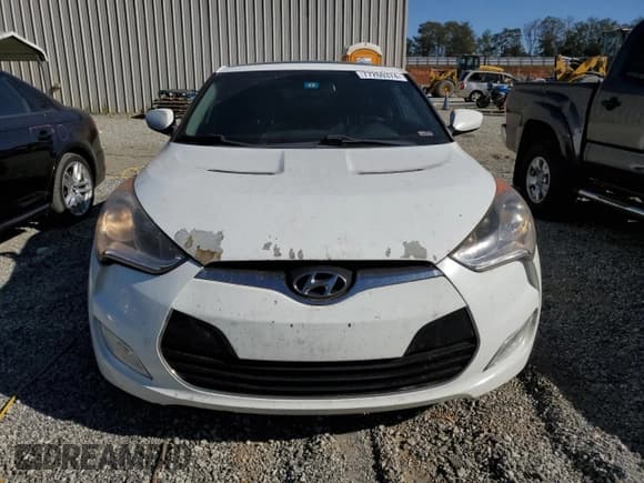 ✅ 2013 Hyundai Veloster w/Gray Int • VIN: KMHTC6AD6DU154098 • Lot: 77260374. Wystawiony na Copart z przebiegiem 159 049 mil. Bezpłatny archiwum sprzedaży aukcyjnych z USA i szczegółowy raport historii pojazdu na DreamBid. Zdjęcie 5.