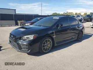 ✅ 2020 Subaru WRX STI • VIN: JF1VA2E61L9804518 • Lot: 69871235. Listed on Copart with 93,292 mi. Free auction sales archive from the USA and detailed vehicle history report at DreamBid. Image 1.