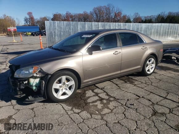 ✅ 2012 Chevrolet Malibu 1LS • VIN: 1G1ZB5E06CF280444 • Lot: 81334554. Listed on Copart with 175,529 mi. Free auction sales archive from the USA and detailed vehicle history report at DreamBid. Image 1.