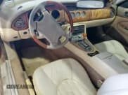 ✅ 1997 Jaguar XK • VIN: SAJGX2748VC017750 • Лот: 67491285. Опубликован ранее на Copart с пробегом Не указан. Бесплатный доступ к архиву аукционных продаж из США и подробный отчёт об истории автомобиля на DreamBid. Изображение 8.