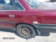 ✅ 1989 Toyota Camry DLX • VIN: 4T1SV21E6KU016842 • Лот: 42838894. Опубликован ранее на IAAI с пробегом 135 395 миль. Бесплатный доступ к архиву аукционных продаж из США и подробный отчёт об истории автомобиля на DreamBid. Изображение 14.