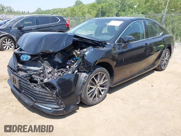 2022 Toyota Camry Hybrid XLE with VIN 4T1F31AK5NU585743, listed as a IAAI auction lot 42481083 with 44,161 mi miles and . Bid and sale history available at DreamBid. Image 17.