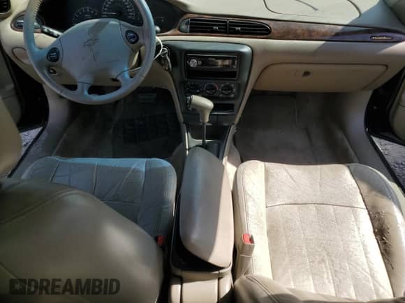 2001 Chevrolet Malibu LS z VIN 1G1NE52J616121147, wystawiony jako Copart lot #74778684 z przebiegiem 186 946 mil mil oraz Szkoda całkowita • Salvage title. Historia ofert i sprzedaży dostępna na DreamBid. Obrazek 8.