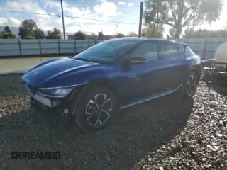 ✅ 2024 Kia EV6 Wind • VIN: KNDC34LA1R5211613 • Lot: 93514455. Wystawiony na Copart z przebiegiem 59 213 mil. Bezpłatny archiwum sprzedaży aukcyjnych z USA i szczegółowy raport historii pojazdu na DreamBid. Zdjęcie 1.