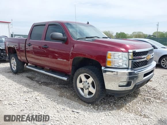 ✅ 2014 Chevrolet Silverado 2500HD LT • VIN: 1GC1KXC88EF140598 • Lot: 42023482. Listed on IAAI with 300,929 mi. Free auction sales archive from the USA and detailed vehicle history report at DreamBid. Image 1.