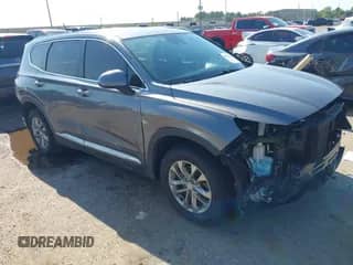 2019 Hyundai Santa Fe SE with VIN 5NMS23AD1KH084726, listed as a IAAI auction lot 43171817 with 69,541 mi miles and . Bid and sale history available at DreamBid. Image 1.
