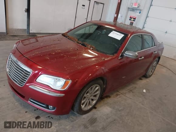 ✅ 2012 Chrysler 300 C • VIN: 2C3CCAET3CH147964 • Lot: 42354125. Listed on IAAI with 152,928 mi. Free auction sales archive from the USA and detailed vehicle history report at DreamBid. Image 2.